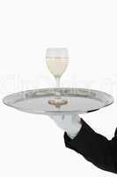 Glass of wine on tray