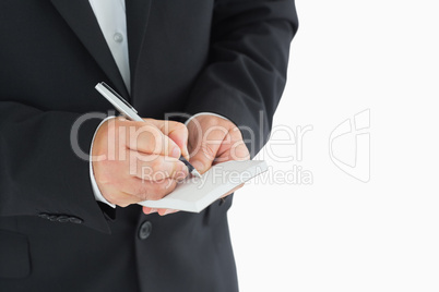 Waiter writing down order