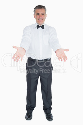Man in a suit with open arms