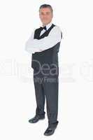 Smiling man with crossed arms