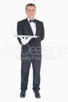 Waiter holding silver tray