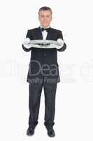 Waiter showing us empty tray