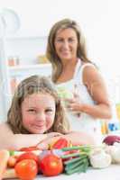 Close up of daughter leaning on table