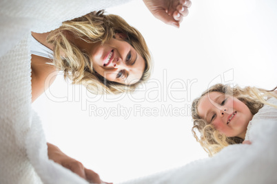 Daughter and mother looking into the box