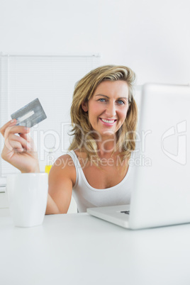 Happy woman shopping online