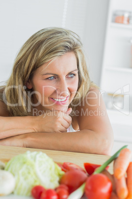 Woman leaning on the table