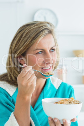 Woman eating cereal