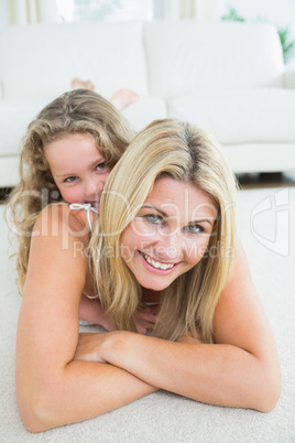 Mother and daughter on the rug