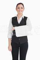 Woman holding dishtowel on forearm