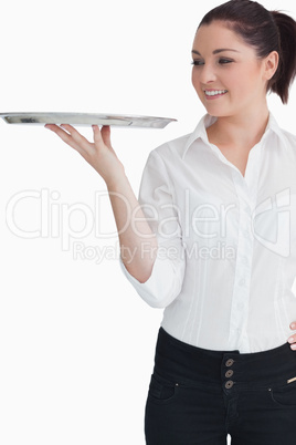 Young woman looking at the tray