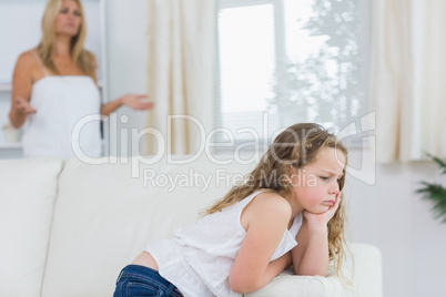 Upset mother talking to daughter