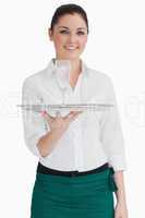 Waitress holding tray with glass