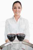 Close up of tray with glasses of wine