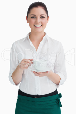 Waitress holding cup