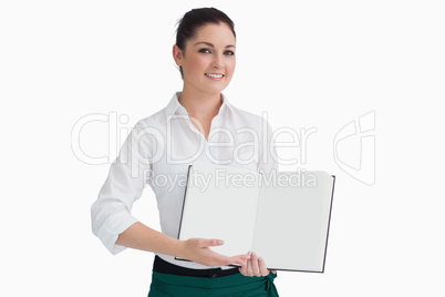 Waitress showing open book