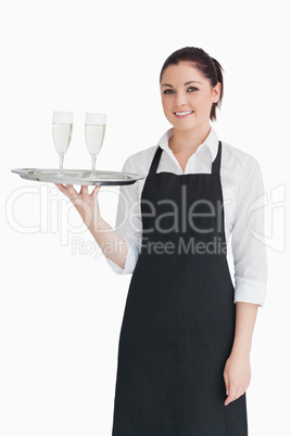 Woman holding two glasses