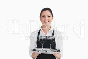 Waitress holding wine