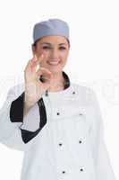 Smiling chef giving the ok sign