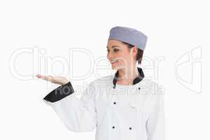 Chef presenting something