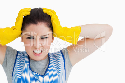 Angry cleaning woman looking at camera