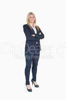 Cheerful business woman crossing her arms