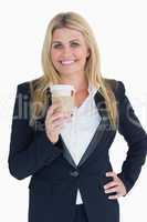 Business woman holding a coffee cup