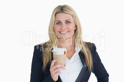 Smiling business woman holding a coffee cup