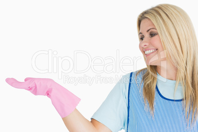 Cleaner woman presenting something