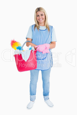 Smiling maid holding a pink bucket