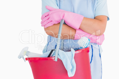 Cleaner holding a pink bucket