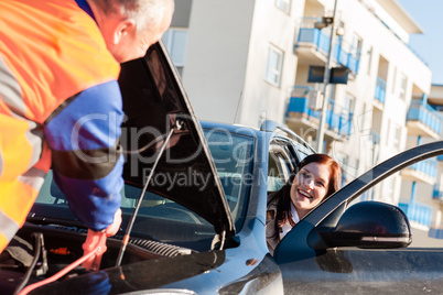 Car troubles woman starting broken vehicle