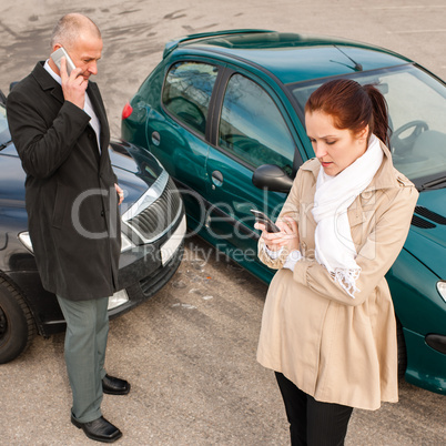 Woman and man on phone car crash