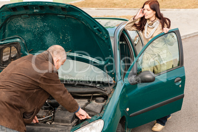 Car breakdown woman calling for road assistance
