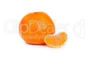 Ripe tangerine or mandarin with slices on white