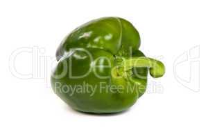 A green sweet  bell pepper isolated on white