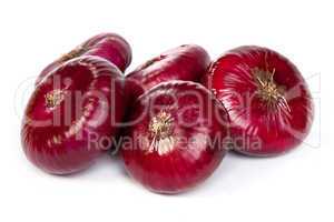 Group of a red onions, isolated on white