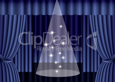 Blue theater curtain with spotlight on stage