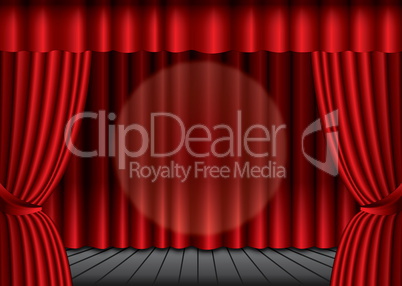 Closed red theater curtain with spotlight in the center