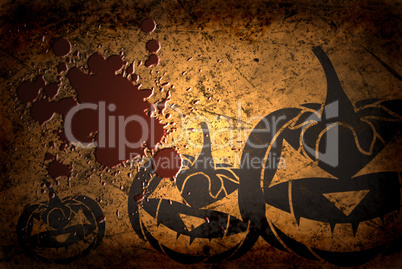 Scary Jack O Lantern halloween pumpkin on  grunge background with blood