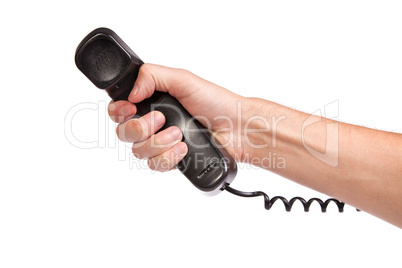 Hand holding an old black telephone tube