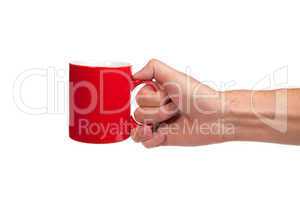 Male hand is holding a red cup