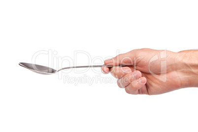 Hand is holding a spoon isolated