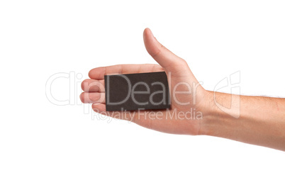 Businessman's hand holding blank business card