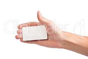 Businessman's hand holding blank business card