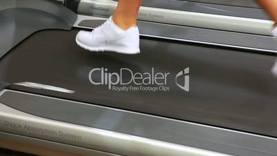 Feet running on treadmill