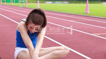 Woman stretching her leg