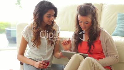 Women using tablet computer