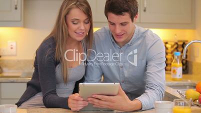 Couple using video chat on tablet pc