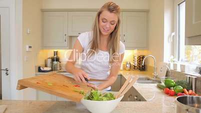Woman is making salad