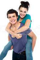 Cheerful and fun loving couple having great time